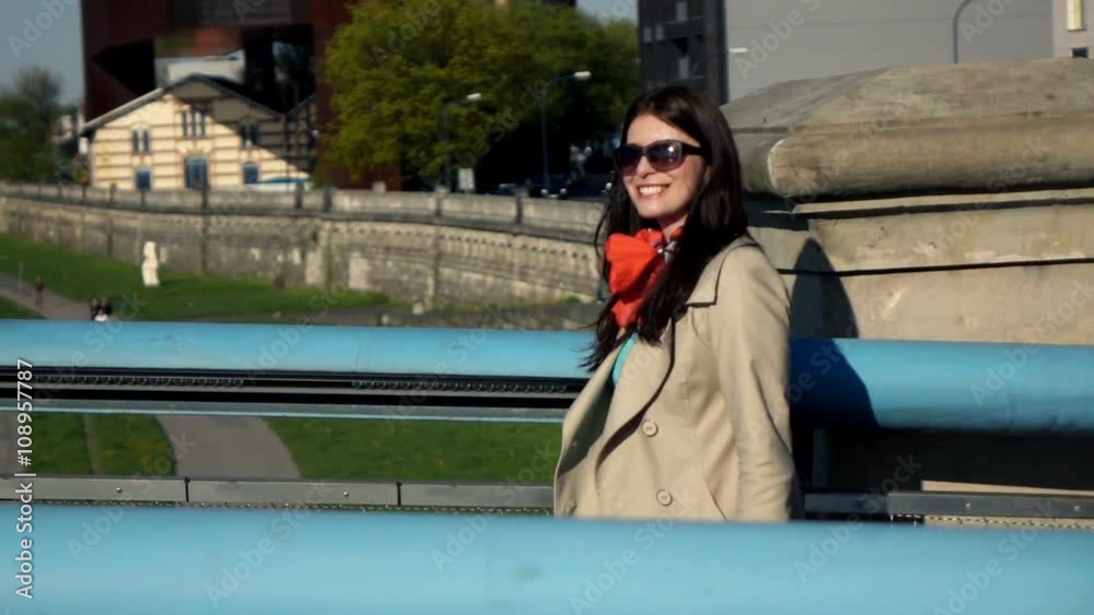 Pretty, happy woman walking on bridge in city, super slow motion 240fps
Pretty, happy woman walking on bridge in city, super slow motion 240fps