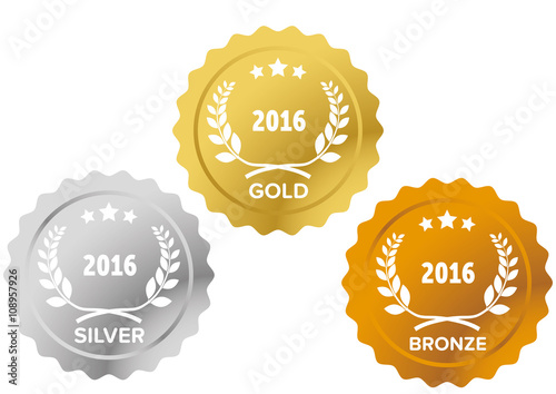 Gold, silver and bronze medals with laurel