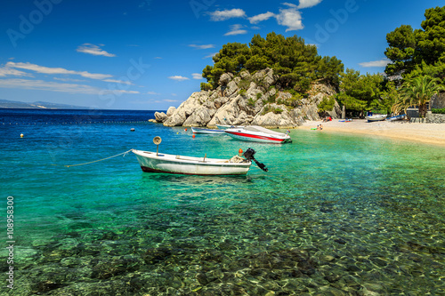 фотографія Beautiful bay and beach with motorboats,Brela,Dalmatia region,Croatia,Europe