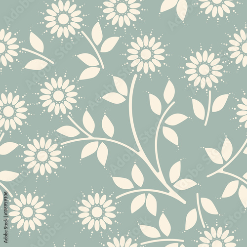 Decorative seamless pattern with chamomile flowers and leaves