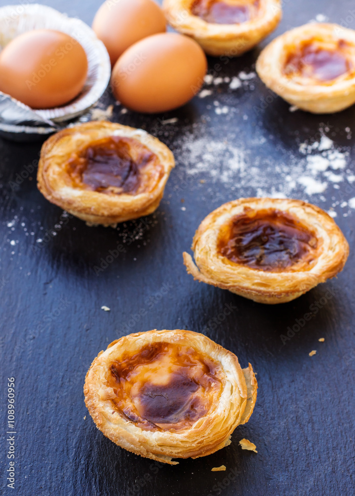 Egg tart on a grunge background Egg tart on a grunge background