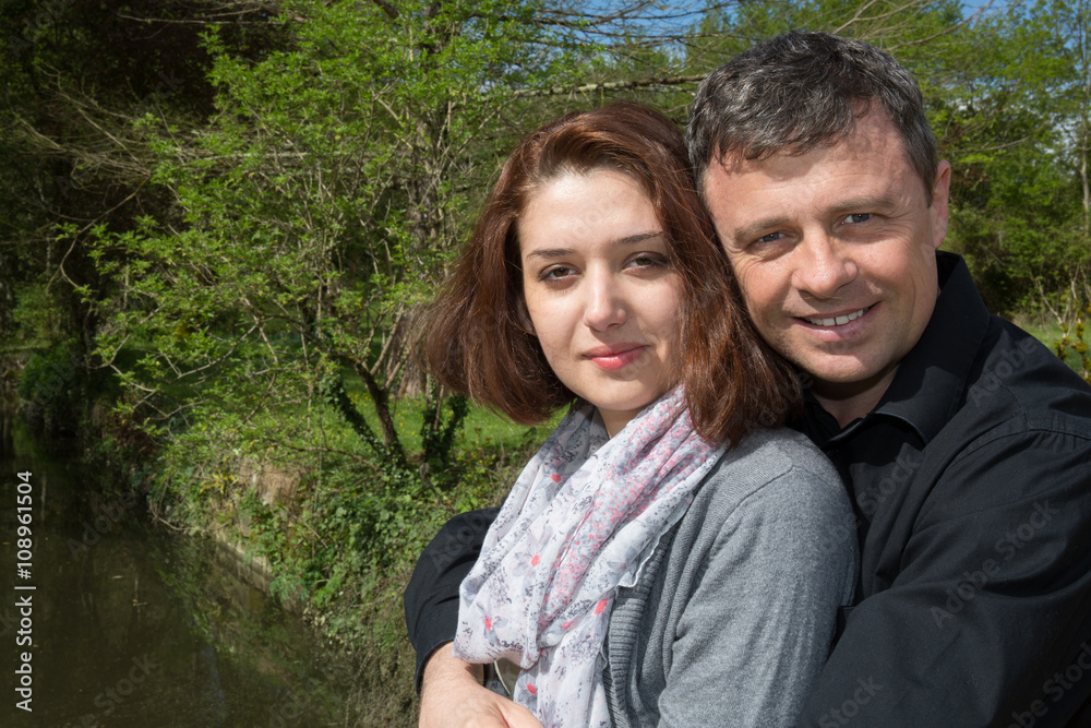 Couple on a the river visiting a city - tourism concept Couple on a the river visiting a city - tourism concept
