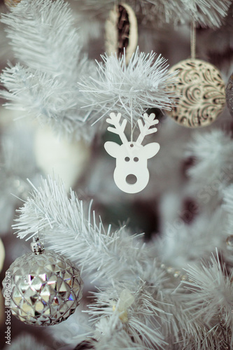 toy reindeer on Christmas tree photo