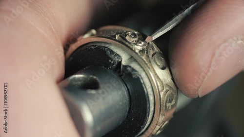 Jewelry Work. Processing of Gold Ring. Close-Up