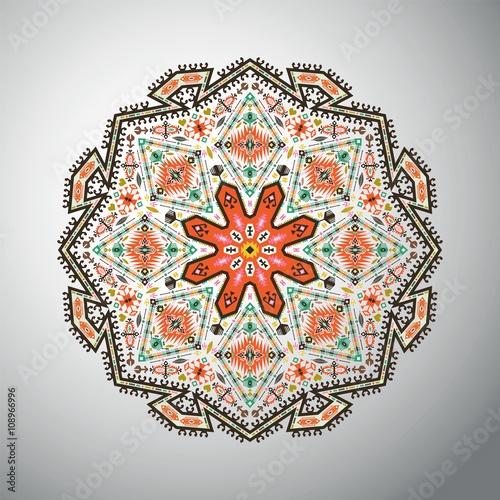 Ornamental round colorful geometric pattern in aztec style