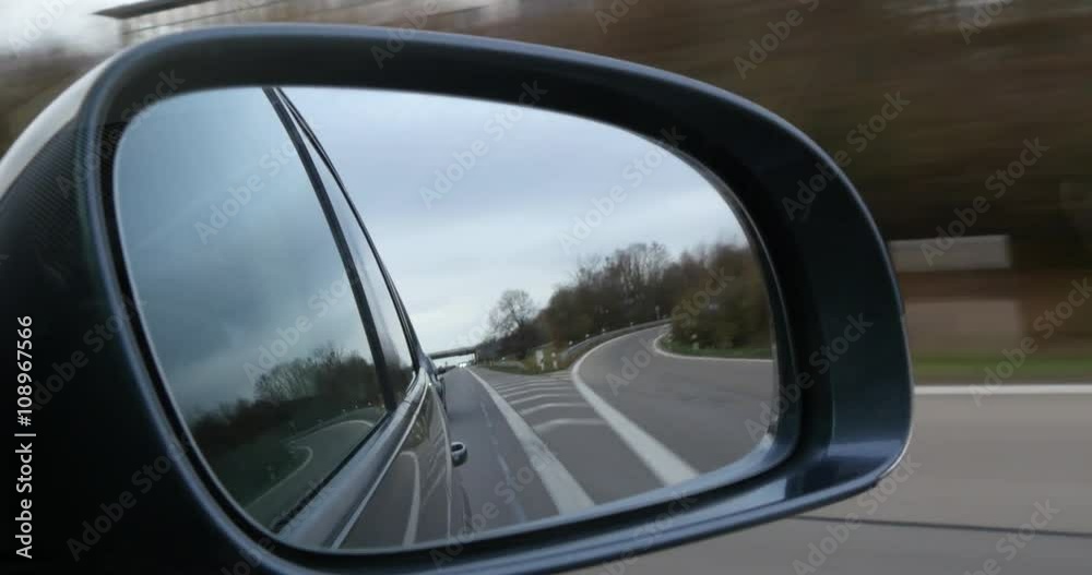4k Side rear-view mirror on a modern car
