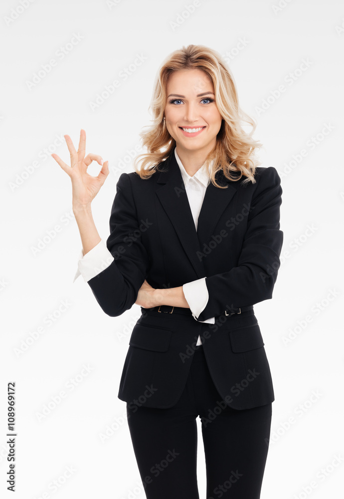 businesswoman showing okay gesture businesswoman showing okay gesture