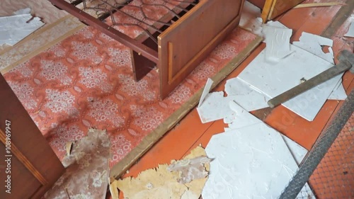 Pan through interior of damaged abandoned house