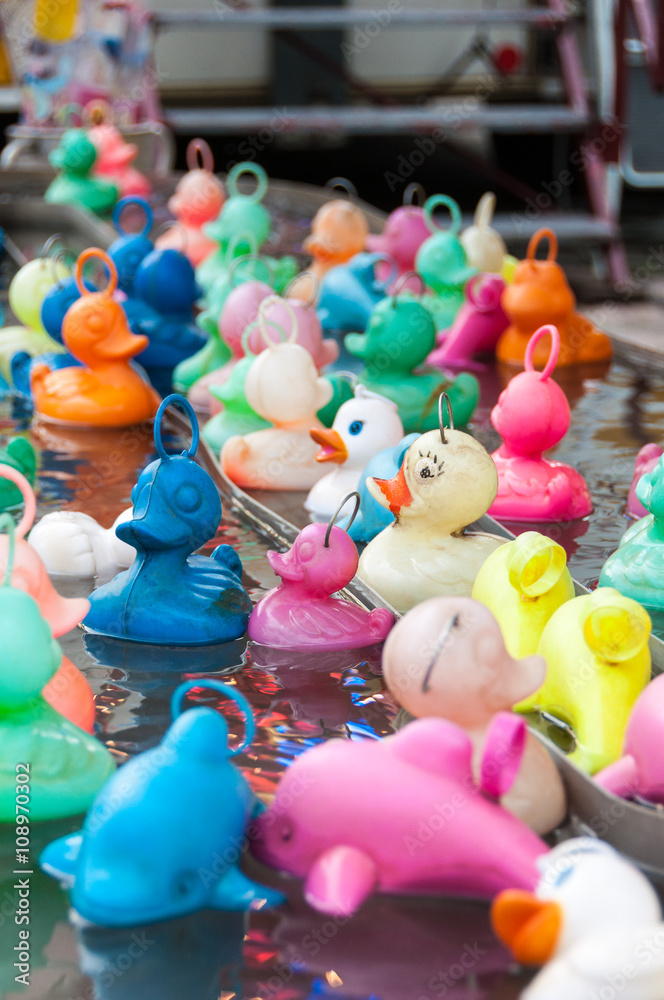 Plastic ducks at a fair Plastic ducks at a fair