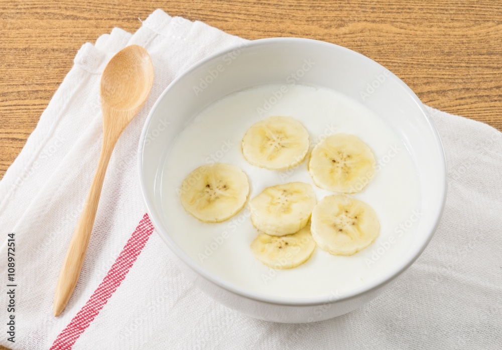 Bowl of Homemade Yoghurt with Organic Banana Bowl of Homemade Yoghurt with Organic Banana