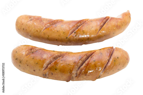 Two fried sausages isolate on white background