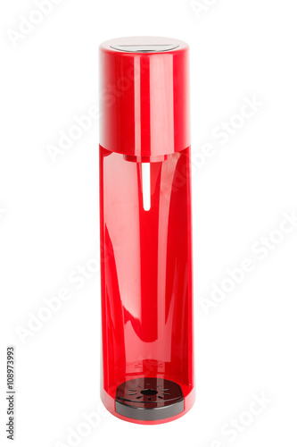 Soda sifon or Seltzer bottle. Red and black plastic.  Side view. Isolated on white background. photo