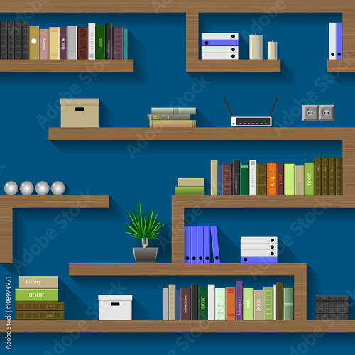 The maze of bookshelves in an interior room on the blue wall