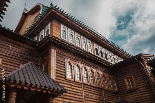 The ancient wooden palace aspires in blue heaven