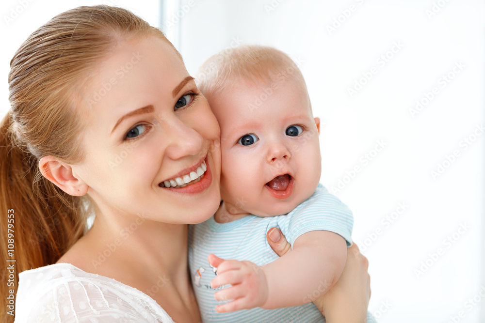 happy family mother playing with baby happy family mother playing with baby