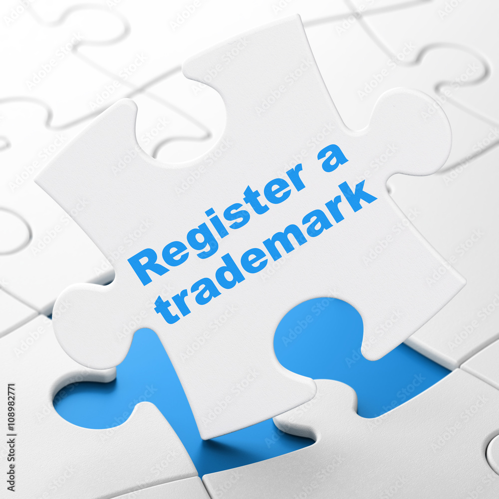 Law concept: Register A Trademark on puzzle background
