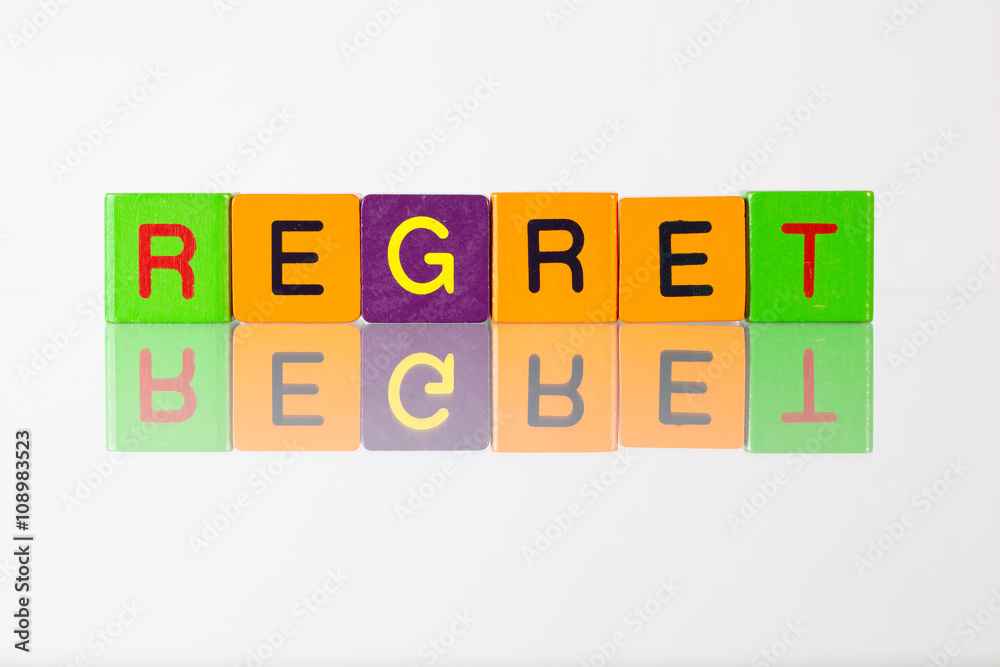 Regret - an inscription from children's blocks