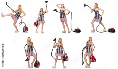 Young woman with vacuum cleaner on white