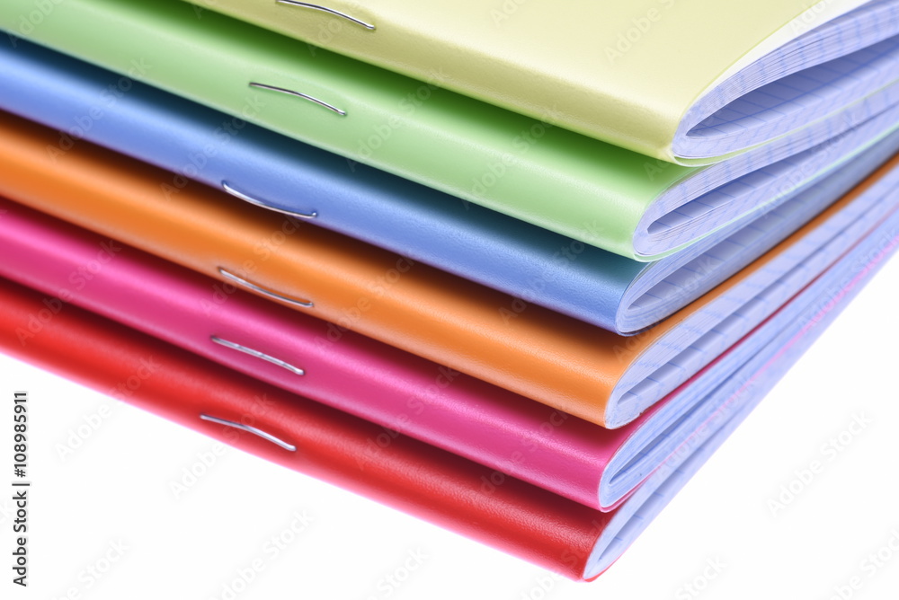 Stack of exercise books isolated on white background Stack of exercise books isolated on white background