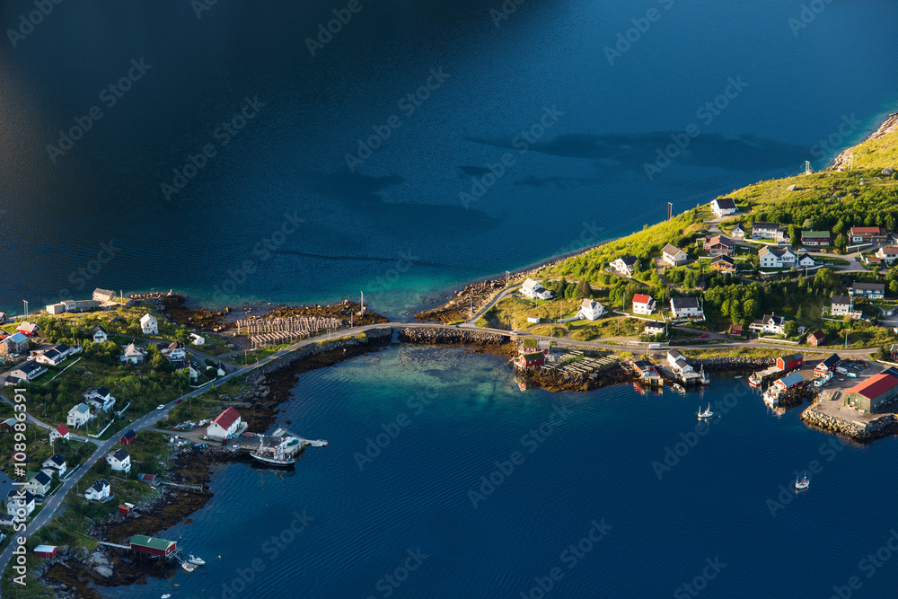 Amazing view of Lofoten islands: village Reine with houses on the coast from height 