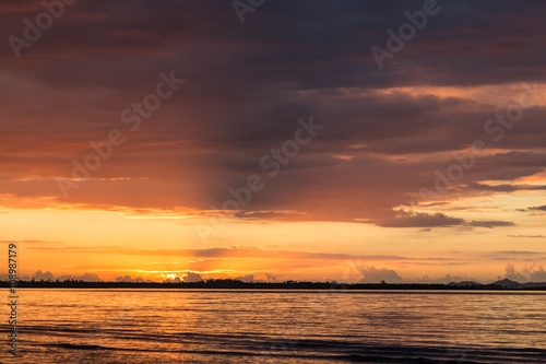 Sunset on the ocean beach.