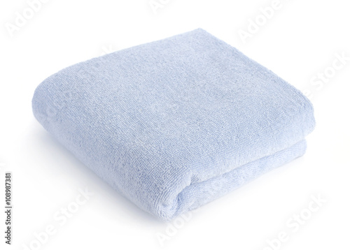 one blue towel isolated on white