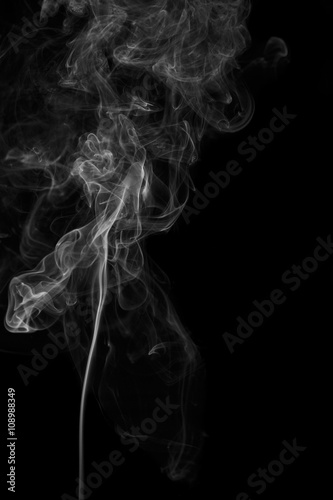 Fototapeta Naklejka Na Ścianę i Meble -  Abstract gray smoke from the incense sticks.