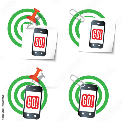 Four targets and thumbtack and smart phone