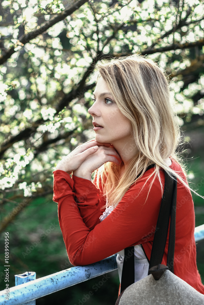 Beautiful hipster girl in white shirt and red cardigan Beautiful hipster girl in white shirt and red cardigan