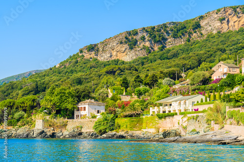 Fototapeta Naklejka Na Ścianę i Meble -  Holiday villa houses on coast of Corsica island in Erbalunga town, France