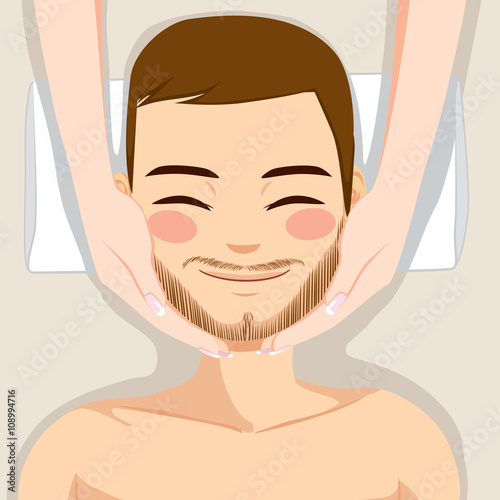 Attractive young bearded man enjoying facial massage skincare treatment