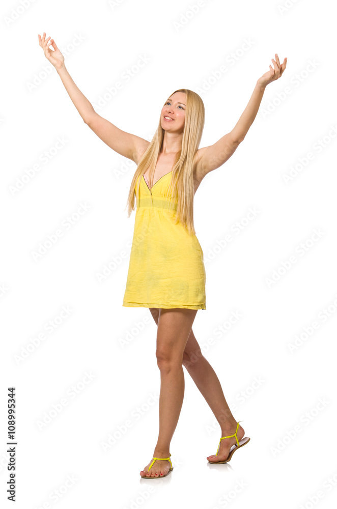 Caucasian fair model in yellow summer dress isolated on white Caucasian fair model in yellow summer dress isolated on white
