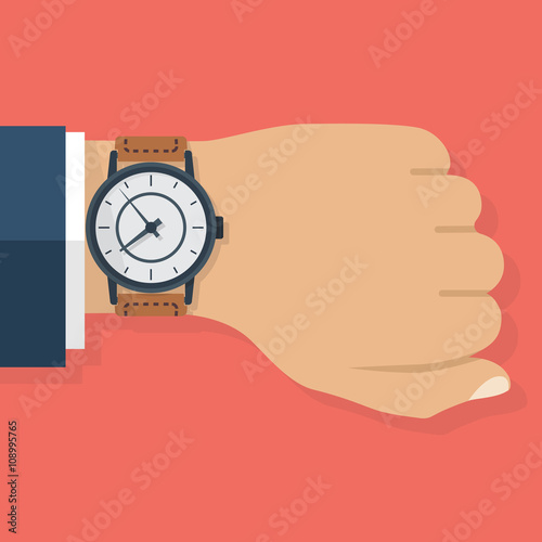 Wristwatch on hand of businessman