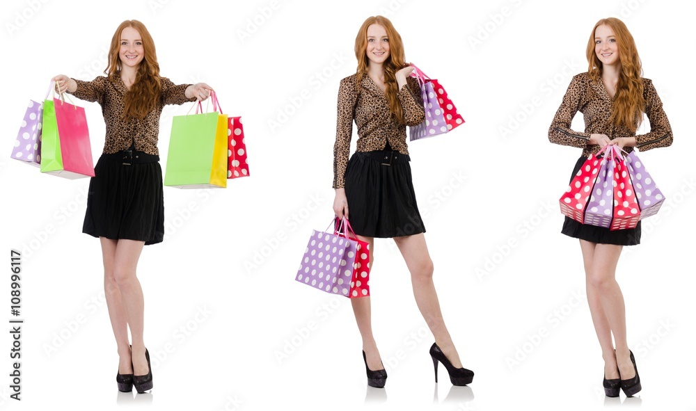 Woman with shopping bags isolated on white Woman with shopping bags isolated on white