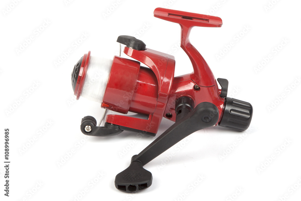 Red Fishing Reel isolated on white Red Fishing Reel isolated on white