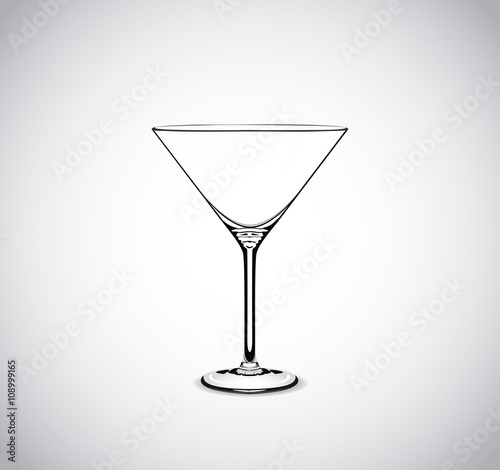 Empty martini cocktail glass isolated on white background.