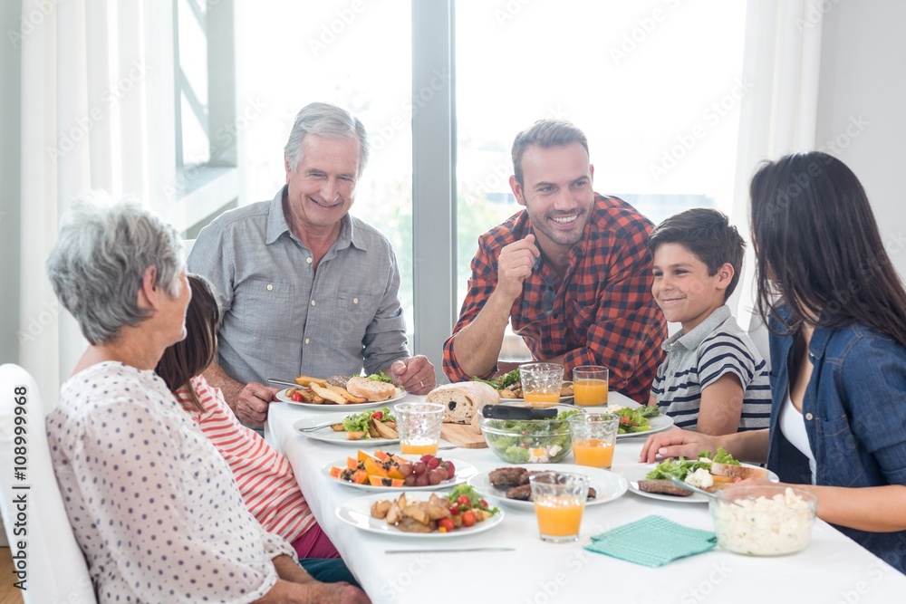 Happy family having breakfast