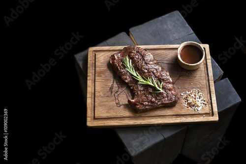 Beef steak. Piece of Grilled BBQ beef  in spices 
