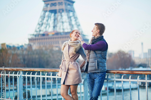 Couple near the Eiffel tower in Paris, France © Ekaterina Pokrovsky