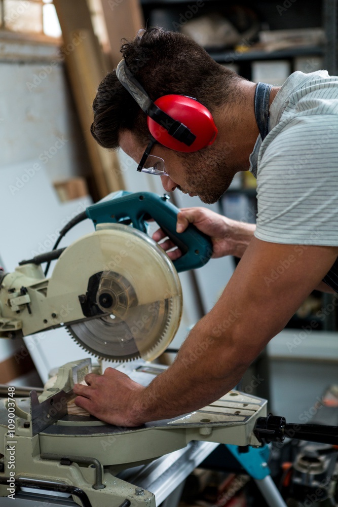 Carpenter working on his craft Carpenter working on his craft