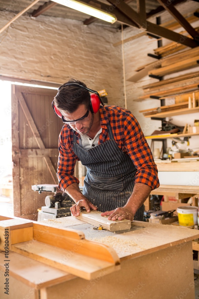 Carpenter working on his craft Carpenter working on his craft