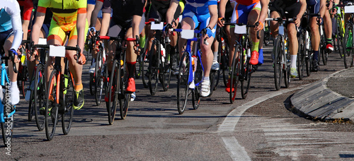 cyclists with fast race bike during the cycling race on asphalt