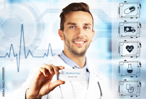 Doctor with business card o...
