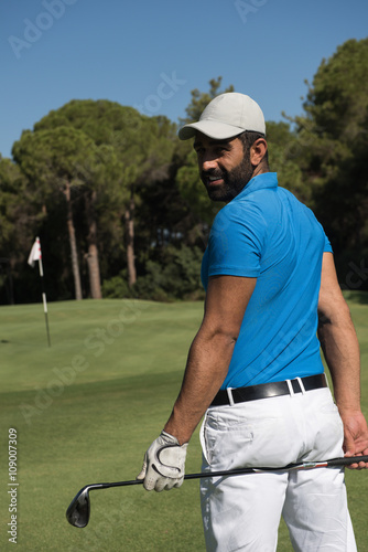 golf player portrait from back