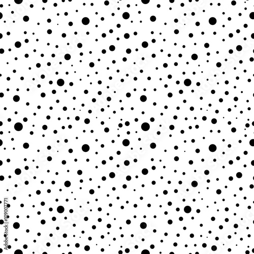 Seamless vector pattern with dots. Black and white background.