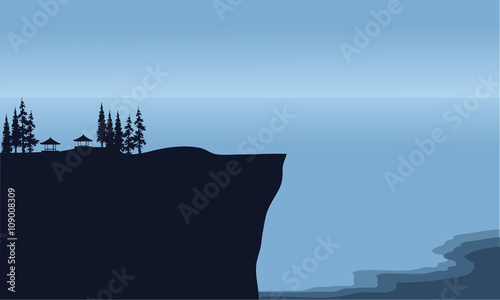 Silhouette of cliff in beach scenery
