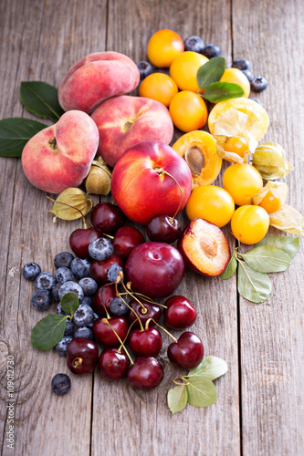 Summer fruits on wooden table