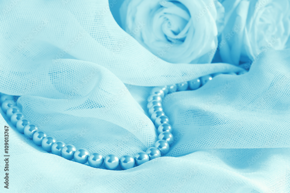 Wedding background with pearl beads and roses