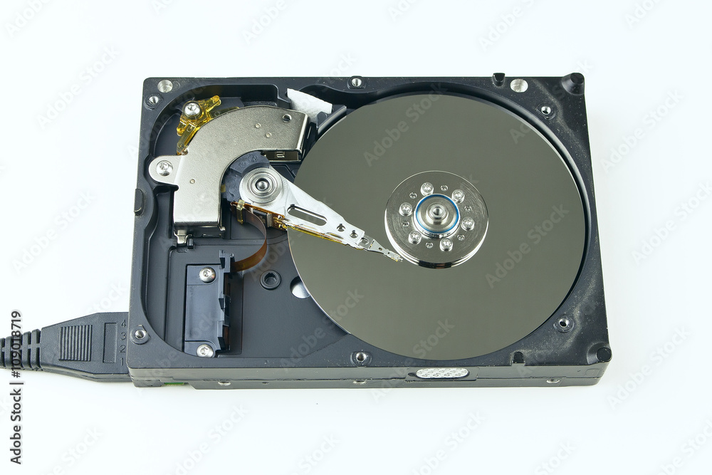 Isolated hard drive from the computer. Principle of operation. Removing the outer cover, the work head in HDD. Isolated hard drive from the computer. Principle of operation. Removing the outer cover, the work head in HDD.