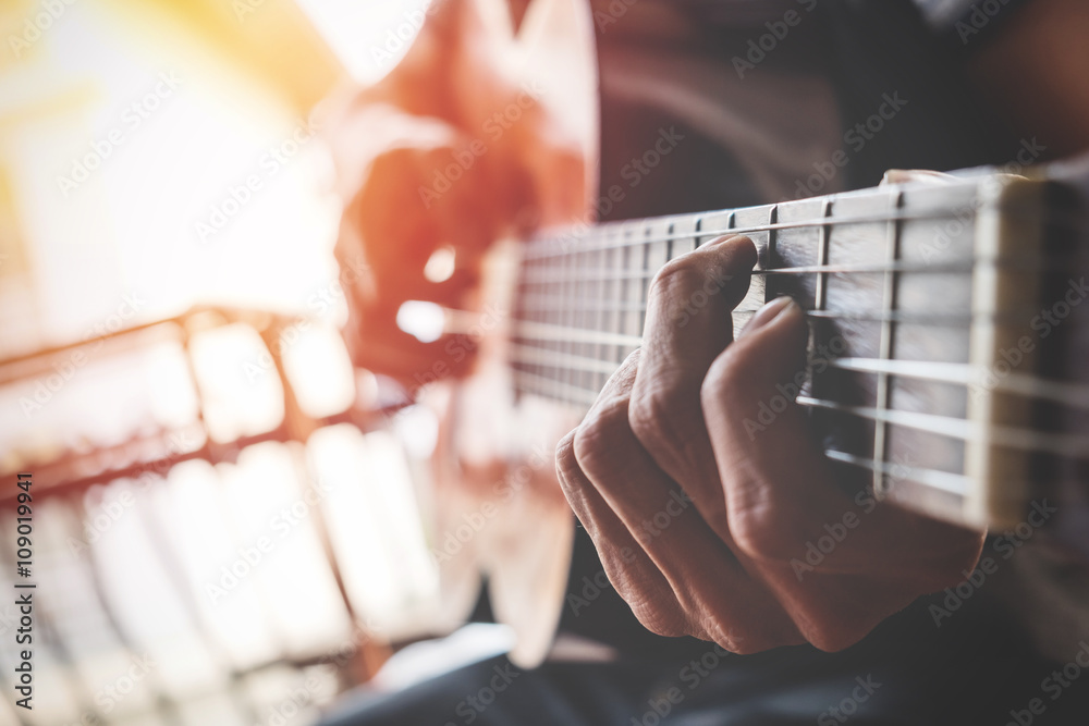 Fototapeta premium boys hand with a guitar